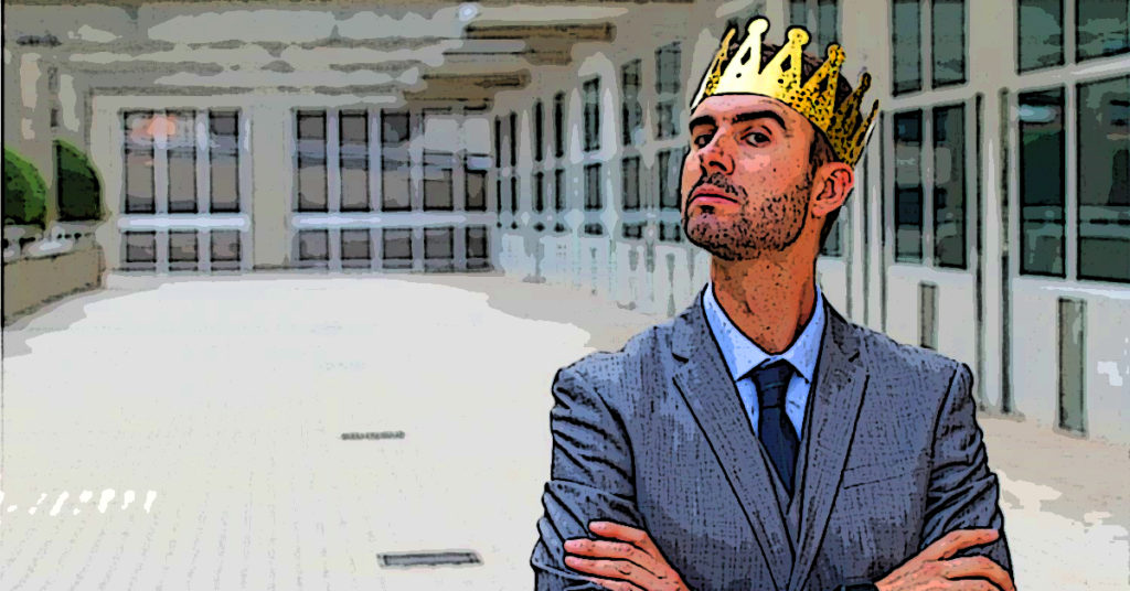 A cartoonish photo graphic shows a business man wearing a golden crown, illustrating the concept of psychological Inflation.